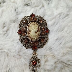 Elegant Cameo Brooch with Gold and Brown Accents